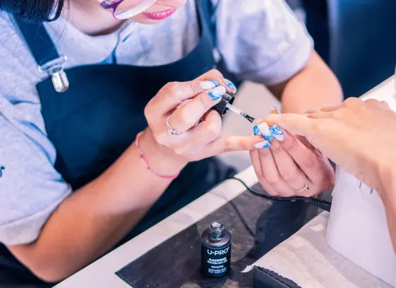 Blue and white polish application — inspiration photograph
